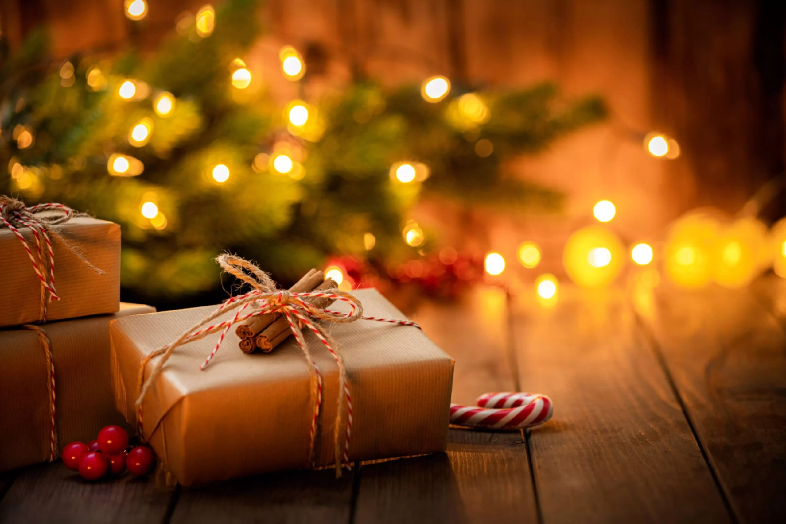 Brown Christmas gift boxes on rustic wooden table