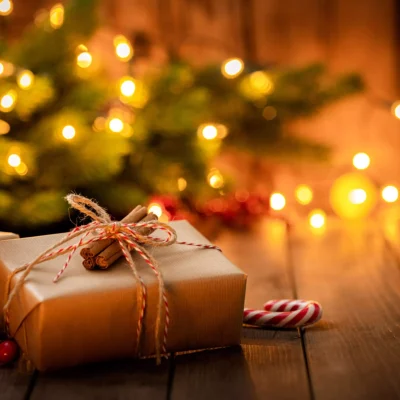 Brown Christmas gift boxes on rustic wooden table